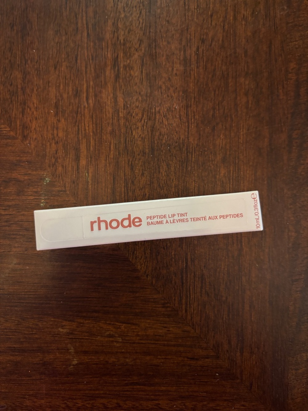 RHODE Peptide Lip Tint in Soft Pink Packaging